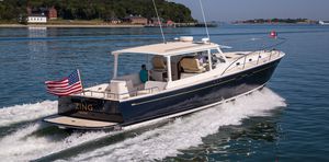 motor-yacht sportivo / lobster / con cabina di pilotaggio / dislocante