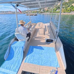 barca open catamarano