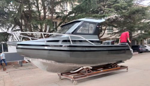 Barca da pesca e diporto fuoribordo - LEADER 588 - Qingdao Allheart Marine Co., Ltd. - con cabina di pilotaggio / max. 6 persone / per ponte in tek