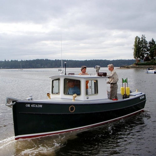 Day cruiser fuoribordo - Dunlin 22 - Devlin - con scafo semiplanante / con cabina di pilotaggio / da pesca sportiva