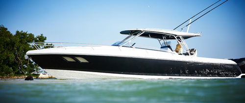 Barca open fuoribordo - 407 CUDDY - Intrepid - trimotore / con cabina / con T-top