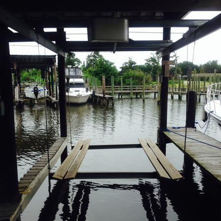 Ascensore per pontoon boat - Lunmar Boat Lifts - galleggiante / con copertura / in acciaio galvanizzato