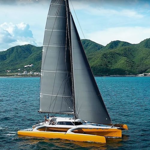 Sailing-yacht trimarano - Rapido 60 - Rapido Trimarans - da crociera / con 2 cabine / con poppa aperta
