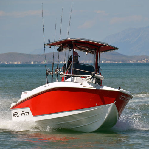 Barca open fuoribordo - 165Pro - Compass Boats - con console centrale / da pesca sportiva / max. 6 persone