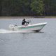 bay boat fuoribordo / con console centrale / open / da pesca sportiva