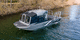 lancia entrobordo / con cabina di pilotaggio / da torrente / in alluminio