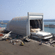 porta per cantiere navale / pieghevole / per garage / elettrica